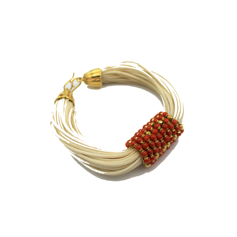 BRACCIALE ORO 18 CARATI, CORALLO E CORDA